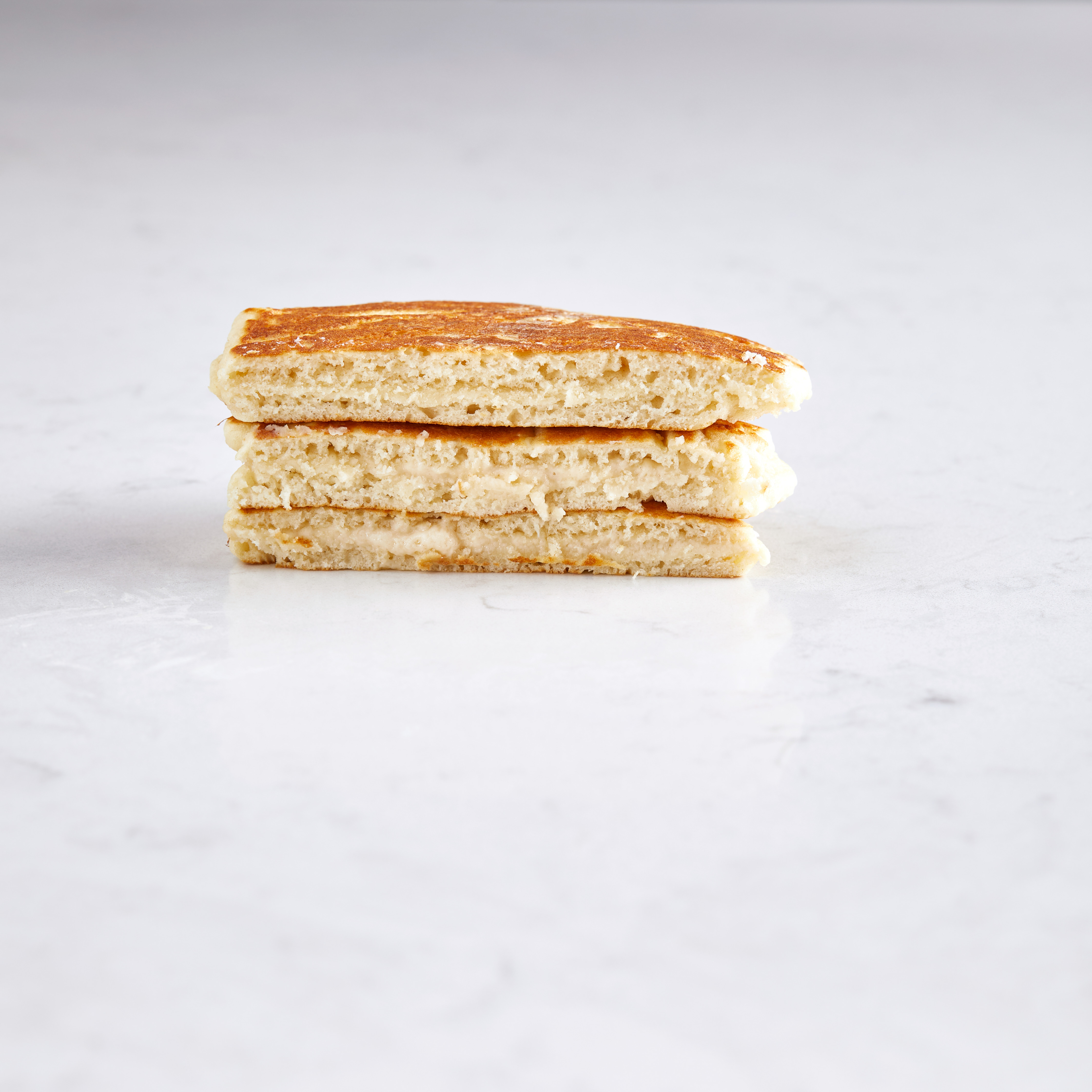 unpuffed, minimal flavored pancakes made with coconut oil