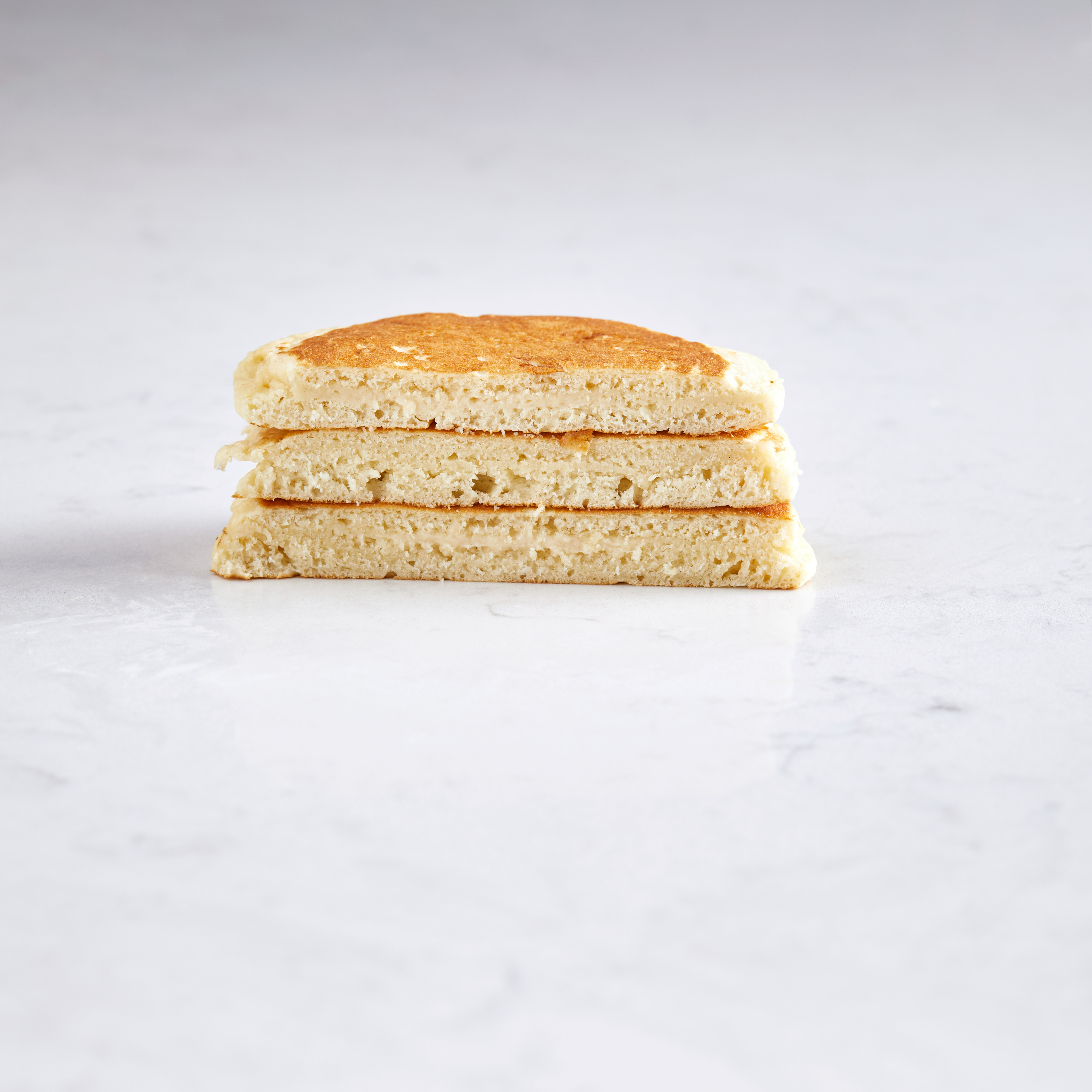 Dense, close pancake made with plant-based spread